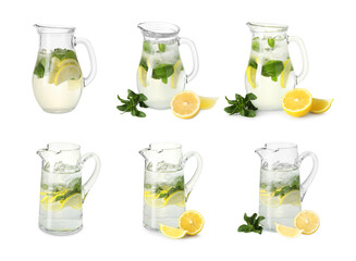 Glass jugs with refreshing lemonade isolated on white, set