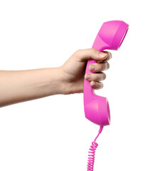 Woman holding pink telephone handset on white background, closeup