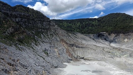 landscape of  limestone craters mountains and hills with blue sky background