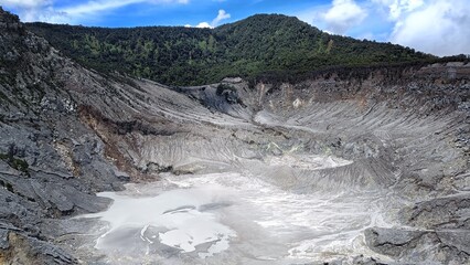 landscape of  limestone craters mountains and hills with blue sky background