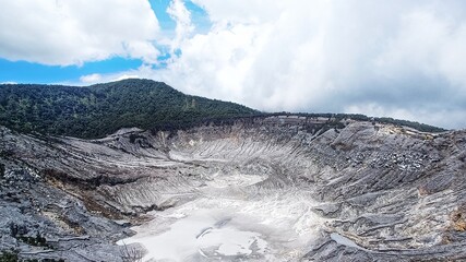 landscape of  limestone craters mountains and hills with blue sky background