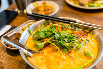 Laksa soup bowl in restaurant
