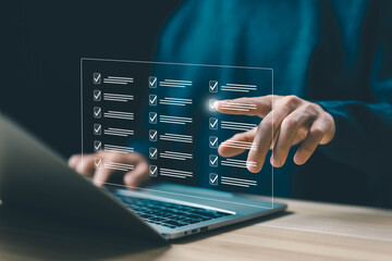 process orders, detail business verify task on a laptop. checklist concept, tick mark evaluation in options check form online. task audit in a list of documents, tick the checkmark in the survey item