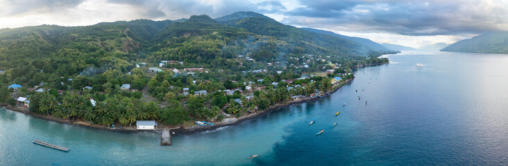 Fototapeta premium The scenic, tropical island of Alor is fringed by coral reef and black sand slopes in eastern Indonesia. This area is part of the Coral Triangle and is home to spectacularly diverse coral reefs.
