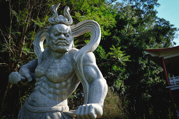 Fototapeta premium statue in the garden, budism