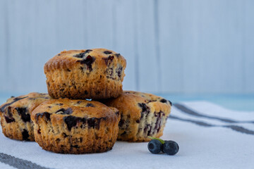 Homemade baked fresh blueberry muffins. Tasty pastry sweet cupcake dessert. Berry pie cupcakes with organic berries. Gluten free healthcare recipe from alternative flour