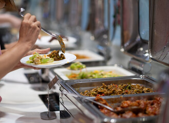 scooping the food, catering, dinner time