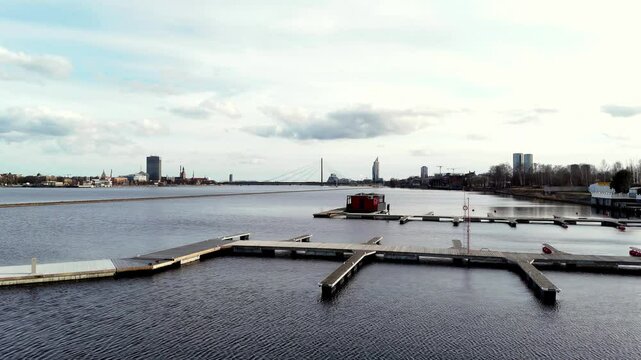 Floating Dock At Daugava River In Kipsala In Riga, Latvia. drone, wide shot