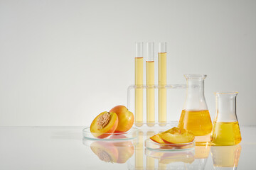Variety experiment tools against on white background. An erlenmeyer flask of yellow extract of...