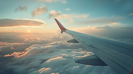 Obraz premium A close-up of an airplane's wing during flight