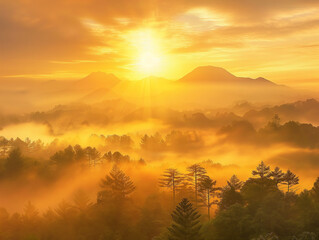  morning sunrise over a misty mountain range and forest. 