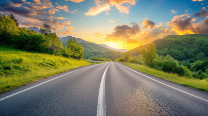 Naklejka premium Asphalt highway road and green mountain with sky clouds at sunrise.