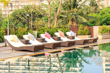 Colorful sunbed around the pool in Thailand