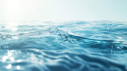 Ripples and light reflections on clear blue water surface. 