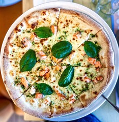 Vegetarian pizza on a table in a restaurant