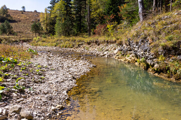 early autumn, hiking in the highlands, panoramic views and a dry riverbed