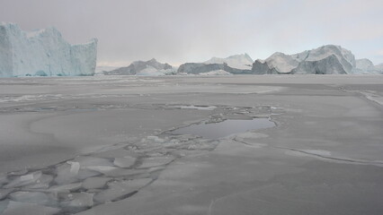 Cold but breathtaking experience to cruise past the giant icebergs