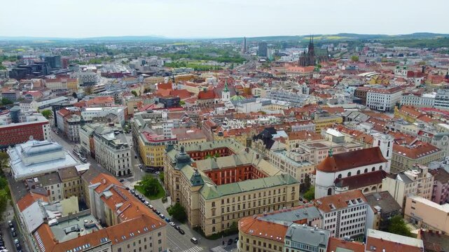 A drone flies forward to aerial view of Brno City, Czech Republic, with its famous landmarks.