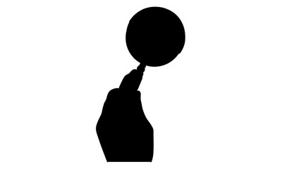 silhouette of hand holding magnifying glass