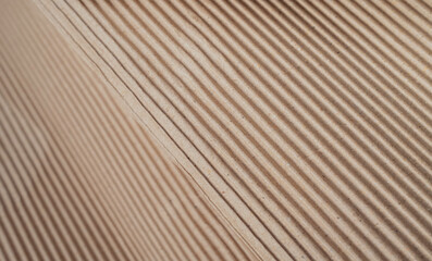 Fototapeta premium Brown paper texture background from a paper box packaging. Paper cardboard background concept