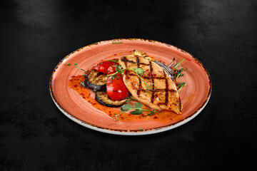 Grilled Chicken Breast with Grilled Vegetables and Sweet Chili Sauce on Ceramic Plate