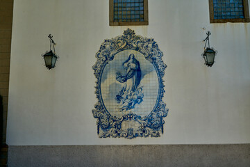 Virgin Mary in blue and white portuguese azulejo tiles.