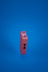 taser in blue background isolated
