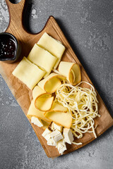 Gourmet Cheese Board with Eastern Cheeses: Suluguni, Chechil, Smoked Adyghe, Imeretian, Brined Cheese