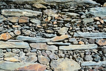 The texture of the masonry. The old stone