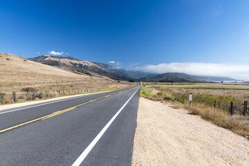 Asphalt road and countryside landscape