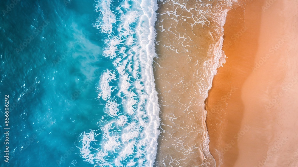 Canvas Prints aerial view of ocean waves crashing on a sandy beach