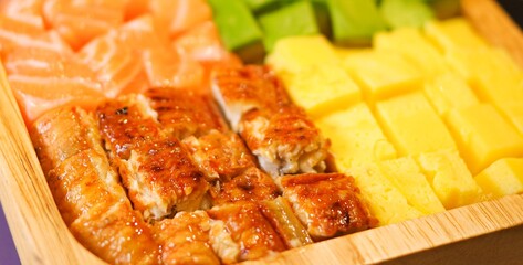 colorful unadon sashimi rice bowl texture avocado cubes chopped salmon grilled eel unagi don bento poke lunch set