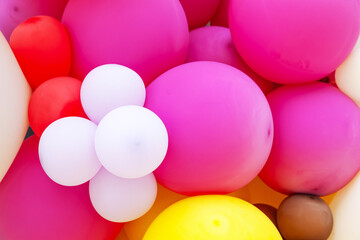 Background from colorful colored inflatable balls.