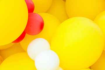 Background from colorful colored inflatable balls.