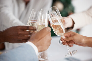 Hands, champagne and success for toast at office with congratulations, achievement and winner in closeup. People, cheers and drinks with goals, team building and celebration at party at Christmas
