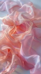 Obraz premium Soft pink silk fabric with delicate folds and a hint of shimmer intertwined.