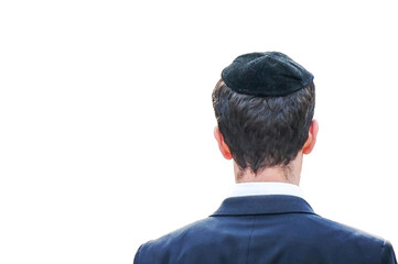 The man is dressed in traditional Jewish and Hasidic clothing. Isolated on a white background.