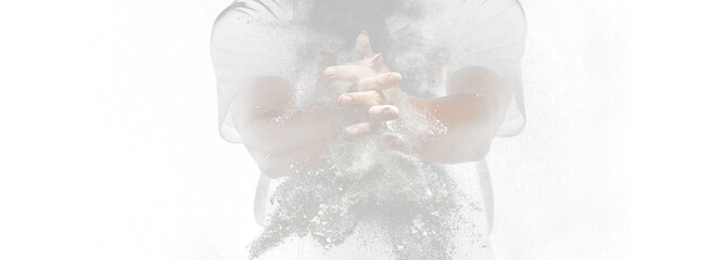 Chef prepare white flour dust for cooking bakery food. Elderly man Chef clap hand, white flour dust explode fly in air. Flour stop motion in air with freeze high speed shutter, black background