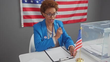 Joyful surprise! african american woman candidate for government blissfully struck with idea, finger pointing to number one, radiates success at electoral college