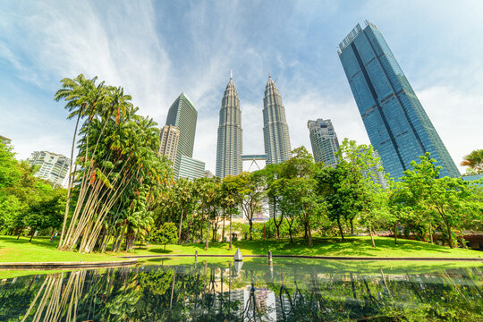 Scenic artificial lake at the KLCC Park and skyscrapers