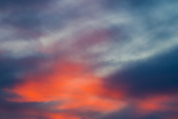 Bright colorful sky sight with dark clouds at sunset