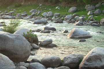 water flowing with rocks in the river