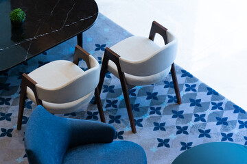 armchairs on carpet in cozy style