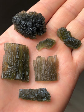 Handful of green Moldavite