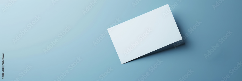 Poster minimalistic blue gradient with floating rectangular paper - a rectangular white paper floats on a b
