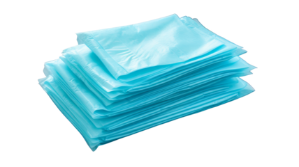 Stack of blue polyethylene bags isolated on white background. Clean, empty plastic bags suitable for various uses and packaging.