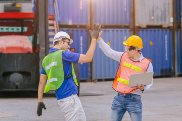 Happy engineer worker enjoy working together, Help support friend at work in logistic industry.