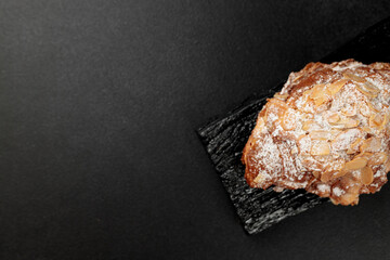 Almond croissant. puff pastry, delicate frangipane cream with almonds, enriched with butter. On...
