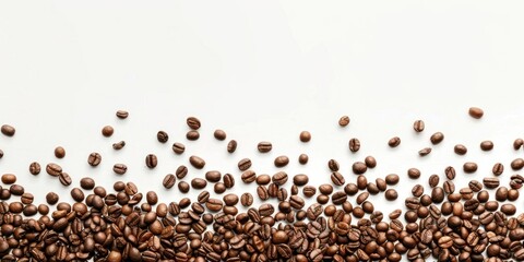 Scattered Coffee Beans on a White Background