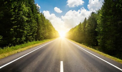 Fototapeta premium An empty highway leading directly into the setting sun's brilliance.